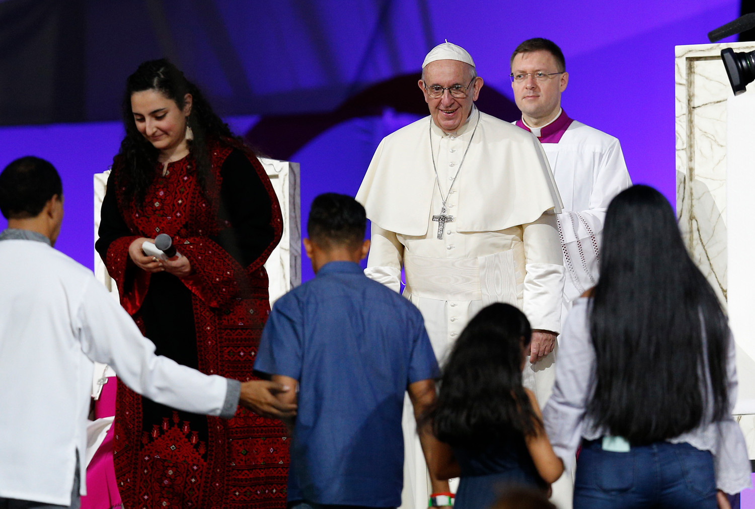 Pope Francis greets families during the World Youth Day prayer vigil at St. John Paul II Field in Panama City Jan. 26, 2019.